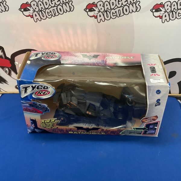 Vintage Tyco RC Batmobile from Batman Begins, detailed remote control car.