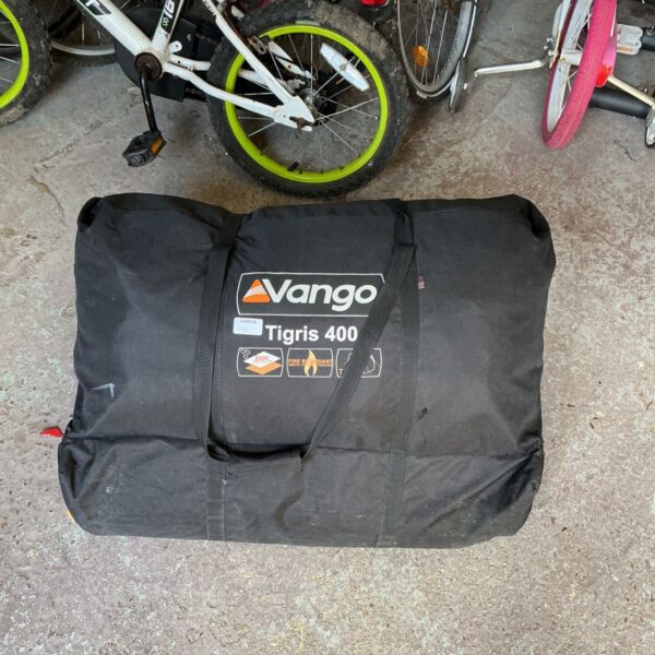 Used Vango Tigris 400 tent for family camping, showing wear.