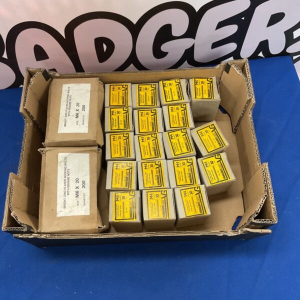 Assorted Vanguard hardware fasteners and roofing bolts in boxes.