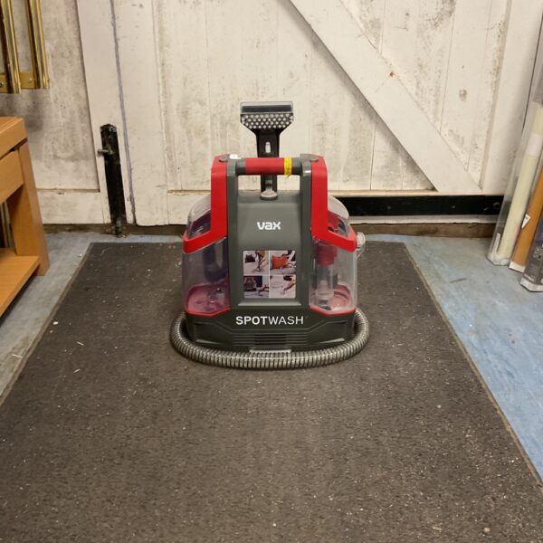 Vax Spotwash portable cleaner for carpets and upholstery stain removal.