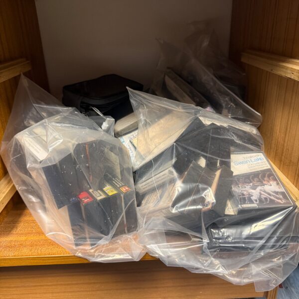 Job lot of vintage VHS tapes for collectors and retro enthusiasts.
