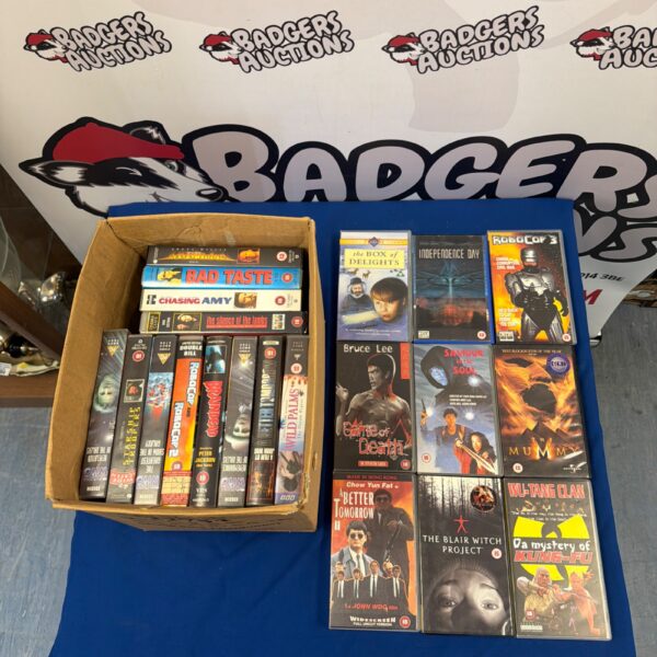 Vintage VHS tape lot featuring Bruce Lee and Brian Dead movies.