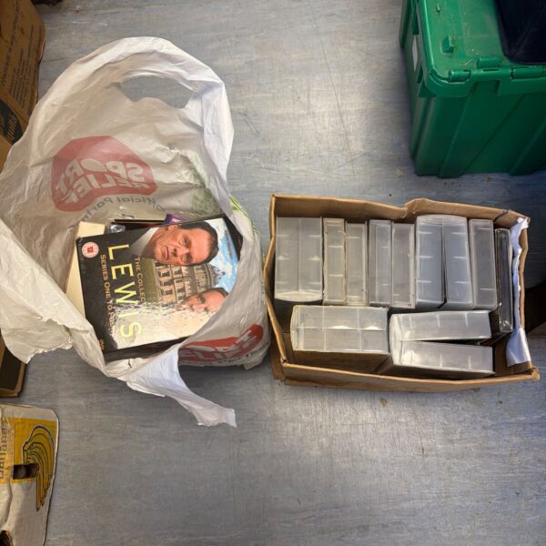 Mixed lot of vintage VHS tapes for collectors.