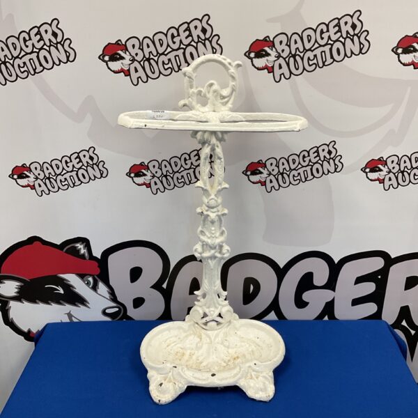 Ornate Victorian cast iron stick stand for umbrellas and walking sticks.