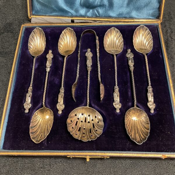 Boxed Victorian silver apostle teaspoons and sugar tongs set.