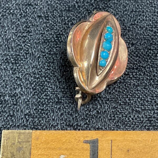 Antique Victorian locket brooch with turquoise stones.