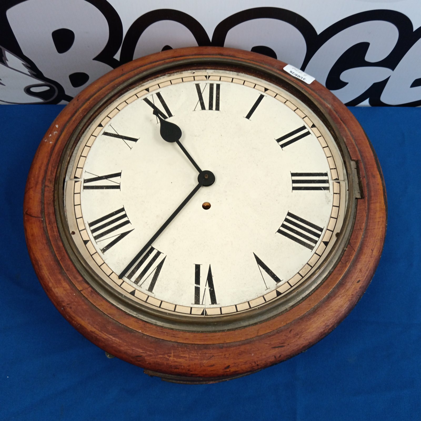 Antique Victorian wall clock with quartz movement and Roman numerals.