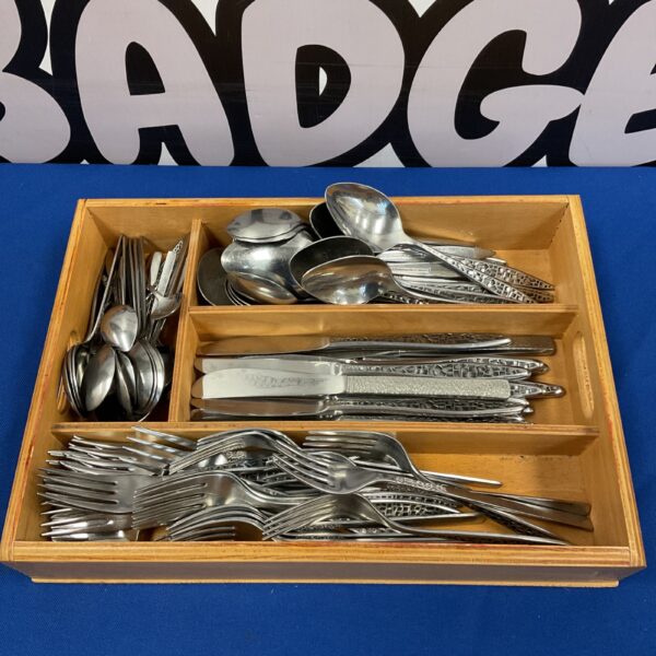 Tray of Viner stainless steel cutlery set for dining.
