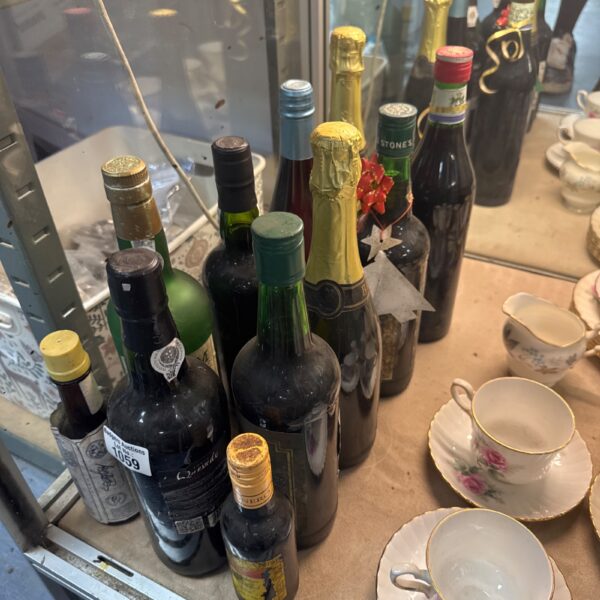 Selection of vintage alcohol bottles from a house clearance lot.