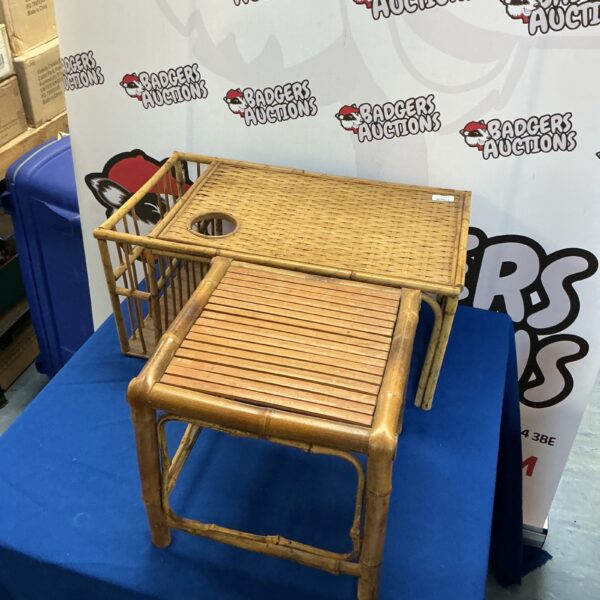 Vintage bamboo side table with woven detail and circular opening.