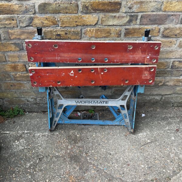 Vintage Black and Decker Workmate portable workbench in used condition.