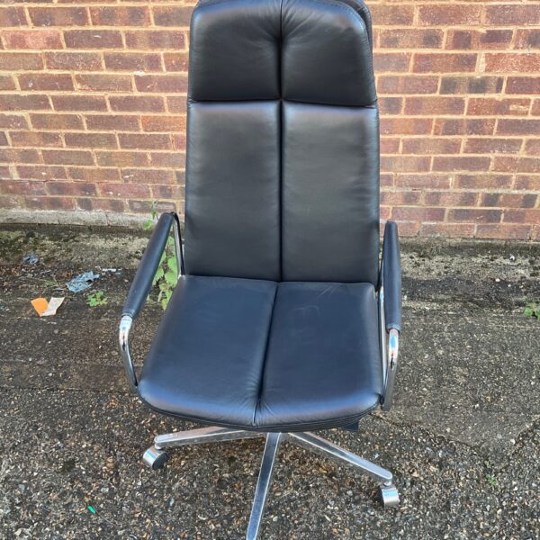 Vintage black leather office swivel chair with chrome base.