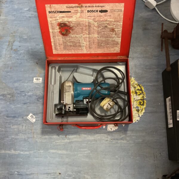 Vintage Bosch 1581 electric jigsaw in its original case.