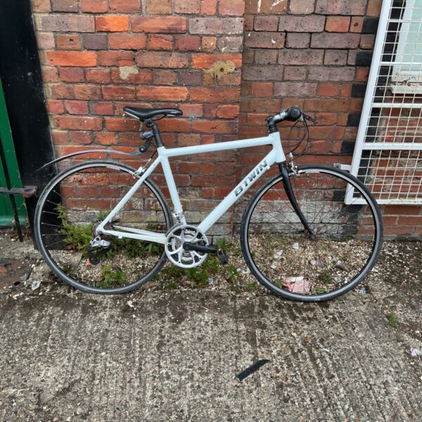 Vintage Btwin road bike side view, classic retro bicycle.
