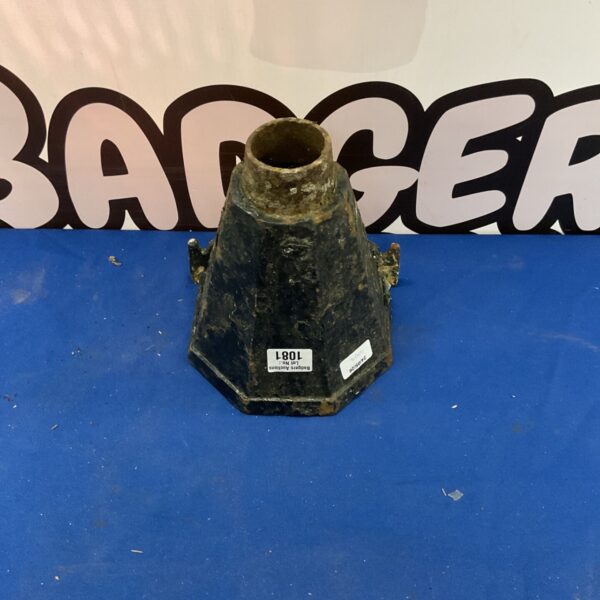 Vintage cast iron rain hopper for rainwater downspout.