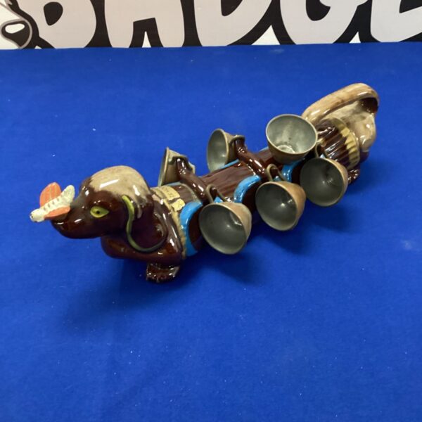 Vintage ceramic hound dog decanter with copper cups.