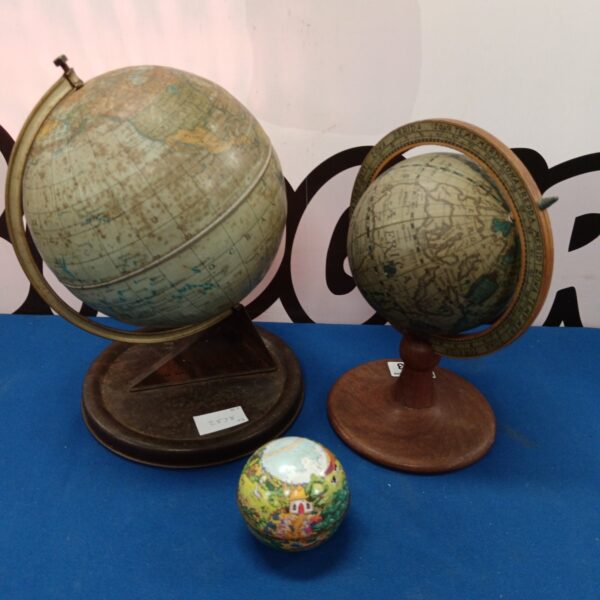 Vintage Chad Valley tin globe with dodo design on wooden base.