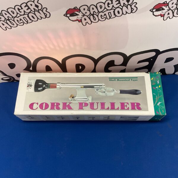 Vintage cork puller, classic wine opener, antique barware.