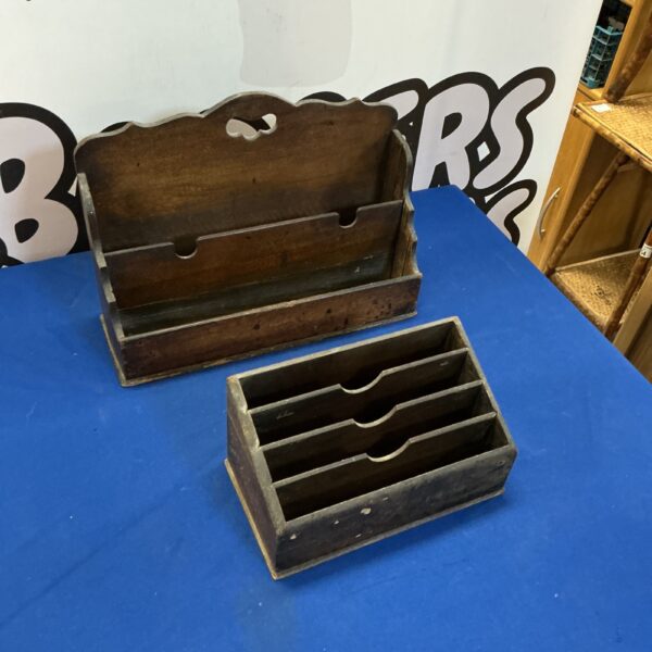 Vintage darkwood desk organiser with multiple compartments for stationery.
