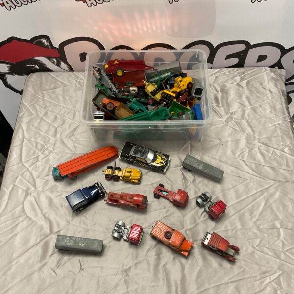 Vintage diecast model collection including Matchbox toy cars.