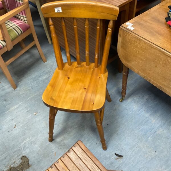 Vintage pine farmhouse dining chair with spindle back.