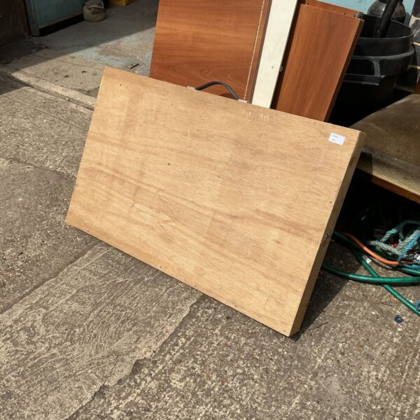 Vintage folding paste table in a workshop setting.