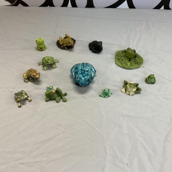 Vintage collection of colourful frog ornaments including Poole Pottery.