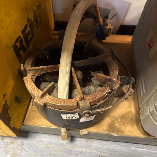 Vintage gas stove burner with rust and patina.