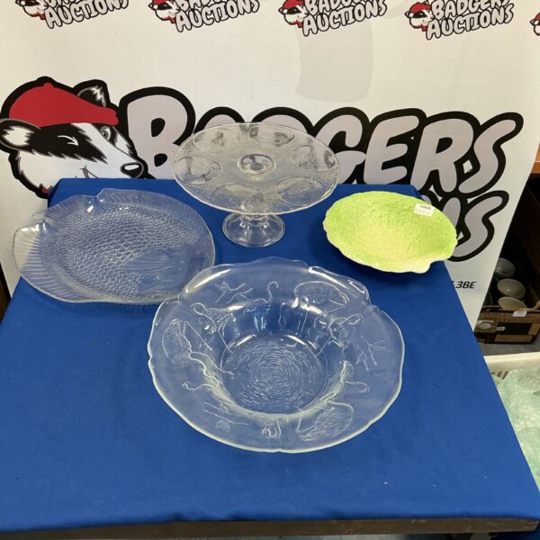 Clear glass cake stand with fluted design, vintage serving dish.