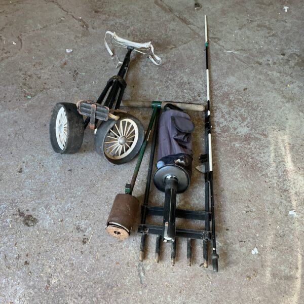 Vintage golf hole making kit with trolley and ball collector.