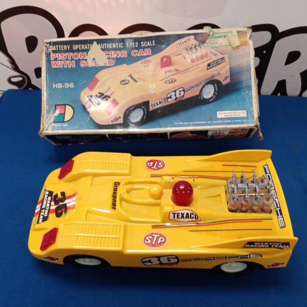 Vintage Hong Den piston racing car with Texaco and Martini branding.
