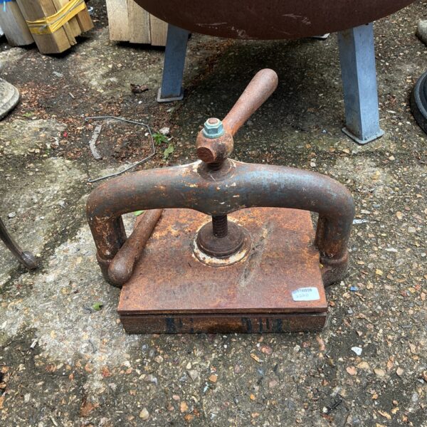 Heavy duty vintage iron press with screw mechanism.