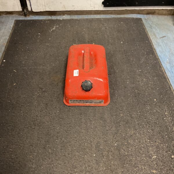 Red vintage Johnson 6-gallon outboard fuel tank.