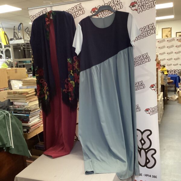 Vintage ladies dresses lot, featuring floral and blue gowns.