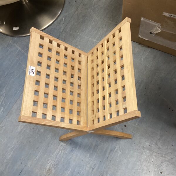 Vintage wooden lattice magazine rack for books and magazines.