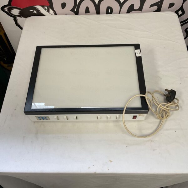 Vintage light box for drawing and tracing with power cable attached.