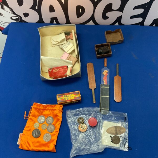 Vintage magic trick set with box and props, collectible illusion toys.