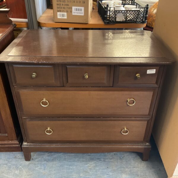 Vintage mahogany chest of drawers with three over two drawers.