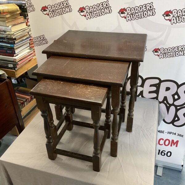 Vintage mahogany nest of tables with turned legs.