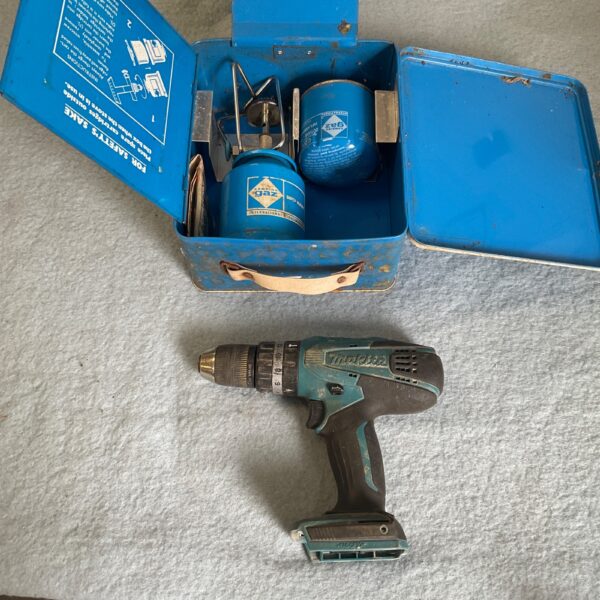 Vintage Makita cordless drill with camping gaz stove attachment.