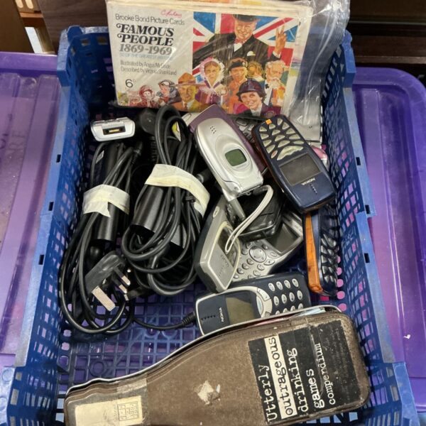 Vintage mobile phone lot with Motorola and Nokia handsets.