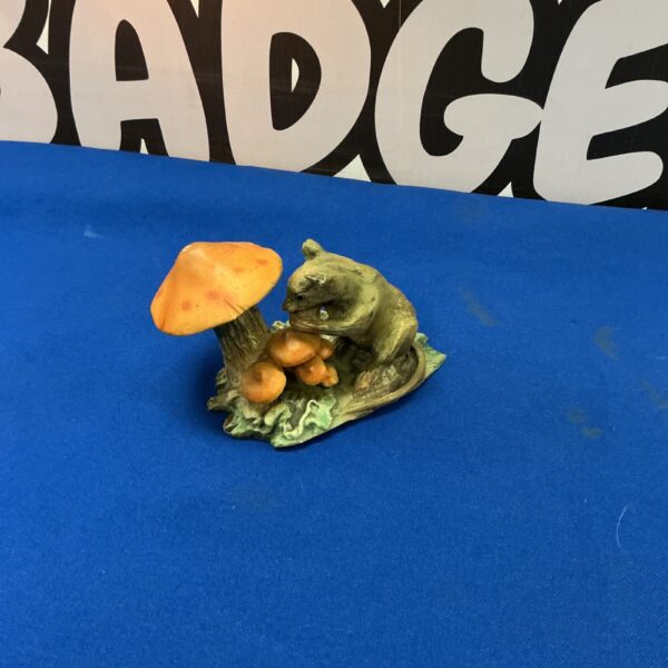 Vintage ceramic mouse figurine with colourful toadstools.