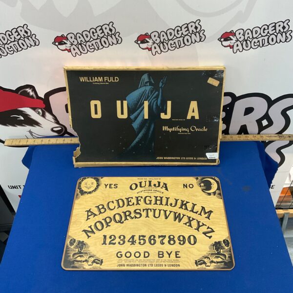 Vintage Mystifying Oracle Ouija board with detailed printed design.