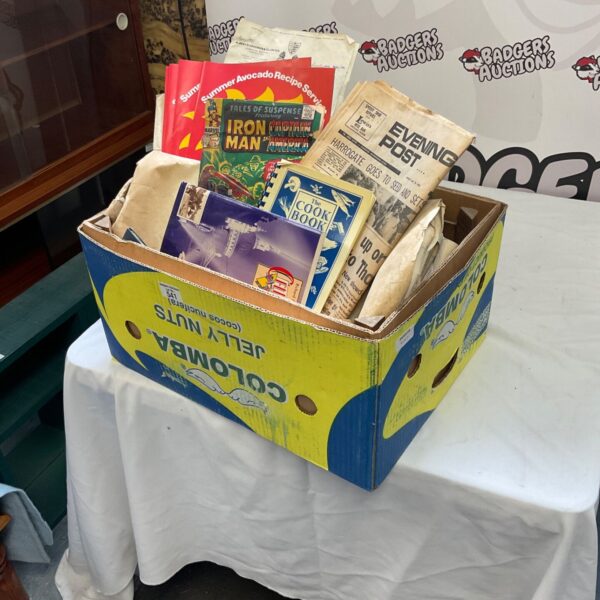 Lot of vintage newspapers and books for collectors.