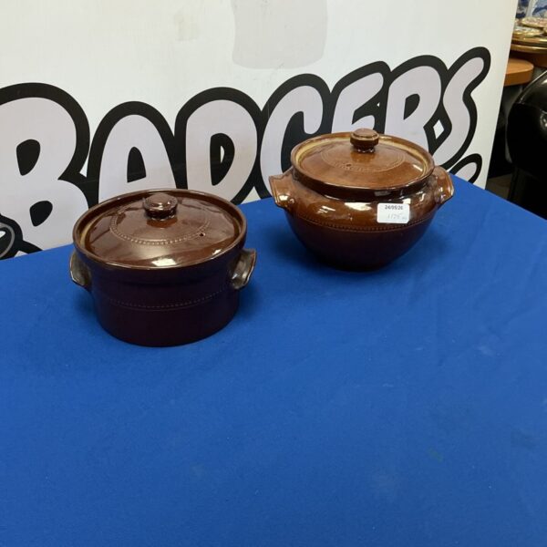Vintage ceramic oven proof cooking pots for kitchen use.