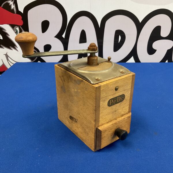 Vintage Pede wooden coffee mill with hand crank.