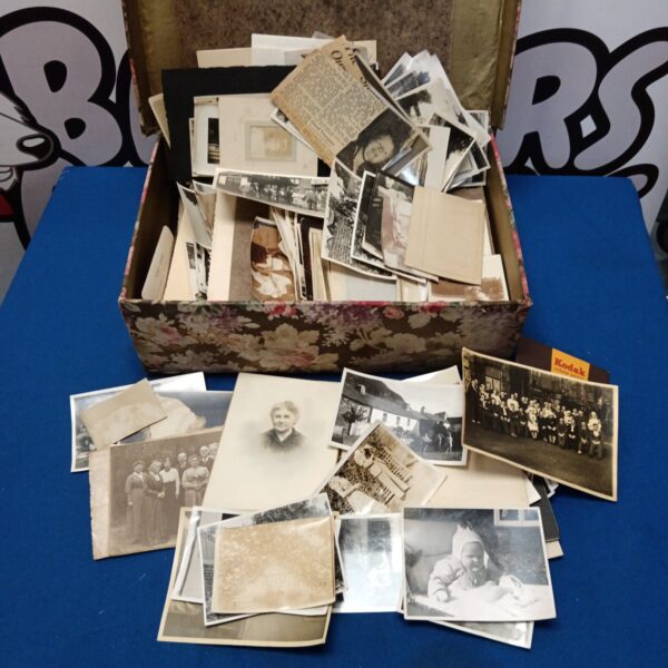 Vintage photograph collection featuring antique portraits and family groupings.
