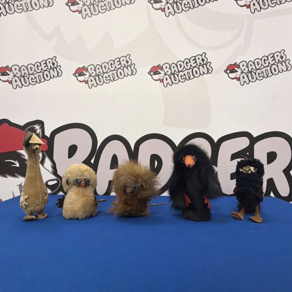 Group of five vintage plush puppets, collectible toys.