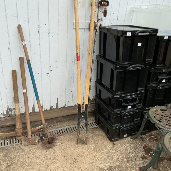 Vintage post digging spade with wooden handle and steel blade.