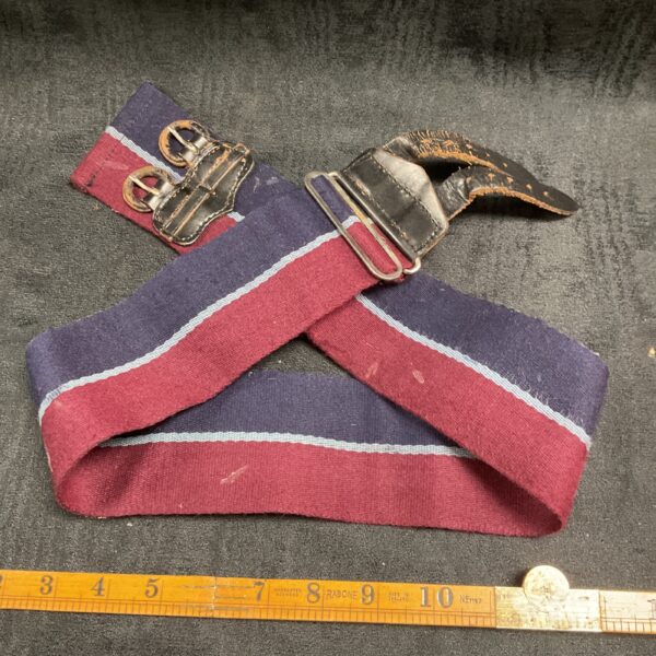Vintage RAF stable belt with striped webbing and buckle.
